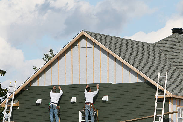 Professional Siding Contractor technician working in Auburndale, MA